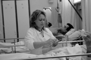 Blog cover photo - A medical professional changes an IV