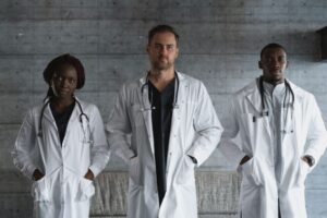 Image of three doctors standing side by side